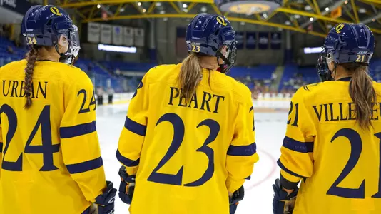 Women's ice hockey stands on the line for the national anthem