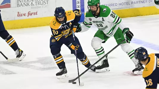 during a NCAA men's hockey game between Quinnipiac University Bobcats and the University of North Dakota Fighting Hawks at Ralph Engelstad Arena, Grand Forks, ND on Saturday, October 15, 2022. By Russell Hons