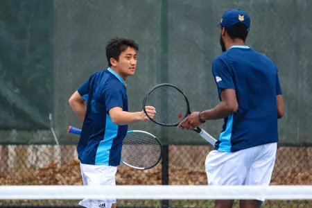 Arakaki/ Brown Celebrate A Point
