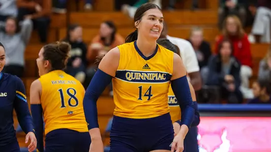 Nicole Legg smiles after a point