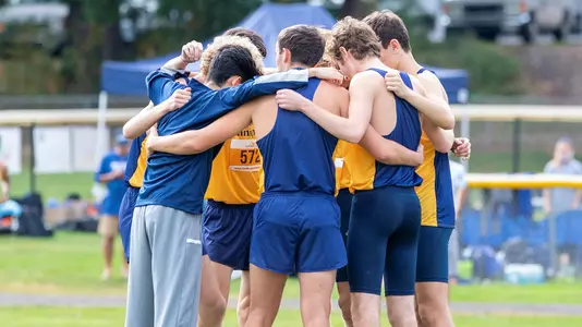 Men's XC Huddles Before its Championship Meet