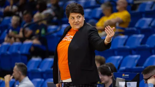 Tricia Fabbri near the bench