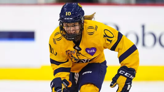 Jess Schryver skates towards the puck against Cornell