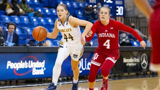 Makenzie Helms drives past an Indiana defender