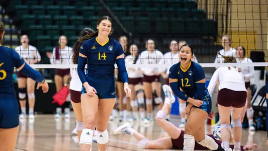 WVB duo celebrates point at MAAC Tournament