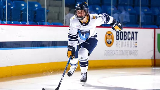 Zoe Uens skates to the blue line during starting lineups against UCONN