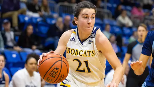 Jackie Grisdale attacks the basket vs URI