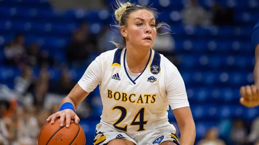 Rose Caverly initiates the offense vs. URI