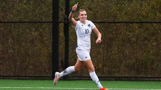 Rebecca Cooke celebrates a goal against Niagara