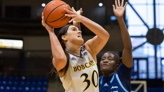 Mikala Morris hook shot at the rim over URI