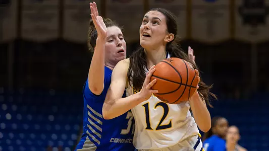 Ella O'Donnell attacks the basket vs CCSU
