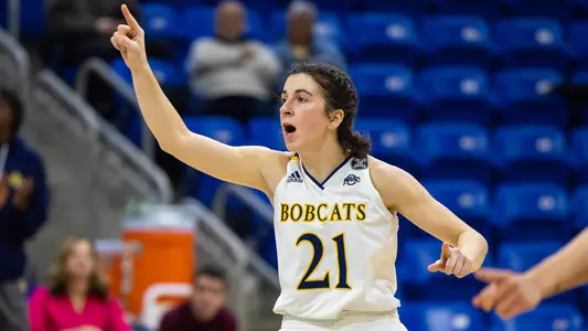 Jackie Grisdale points after a score vs Manhattan