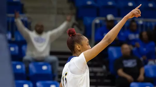 Cur'Tiera Haywood points after an And-1