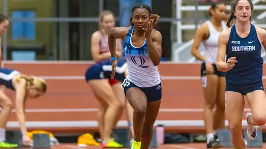 Aisha Gay races in the 200m dash at Yale