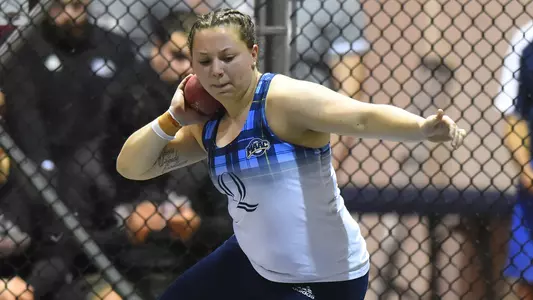 Mikah Maples throws the shot put at indoor meet
