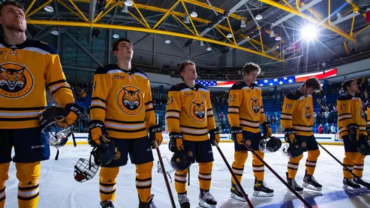 Men's Hockey Stands for National Anthem