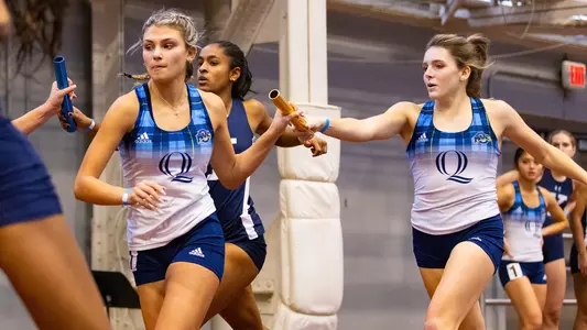 Rylie Smith hands baton to Alyssa Romagnoli