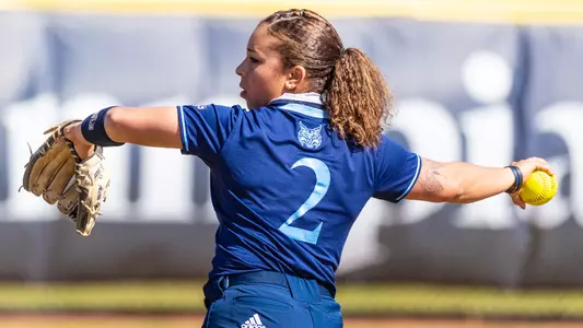Kayla Jensen throws towards second base