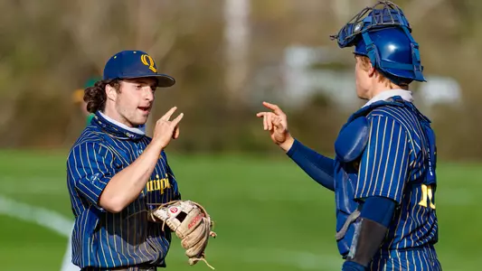 McGwire Tuffy and Danny Melnick embrace after a win