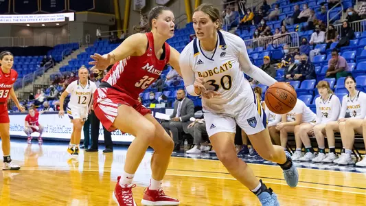 Mikala Morris blows by her defender