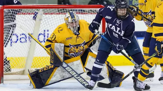Schroeder looks for puck during Yale attack