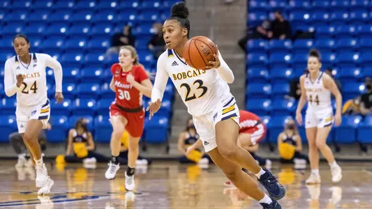 Sajada Bonner dribbles up the floor