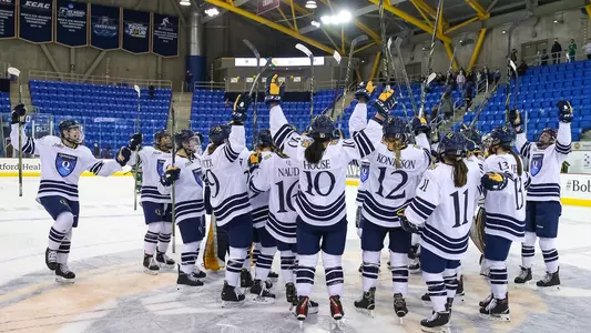 Women's hockey celebrates after 4-0 victory over Clarkson