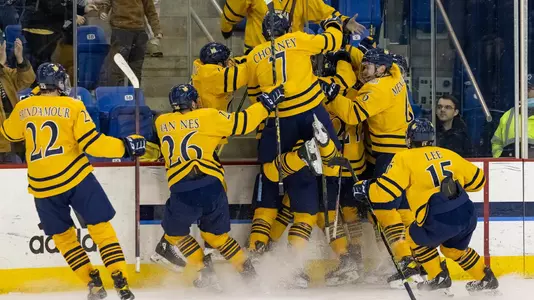 Team Mobs Desi Burgart after 2OT Game Winner against Saint Lawrence