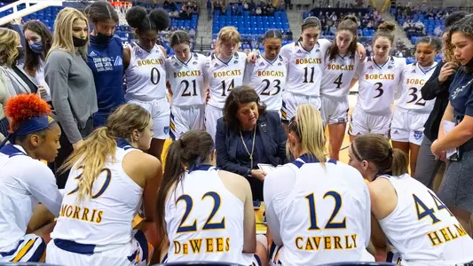 WBB HC Tricia Fabbri draws up a play during a timeout
