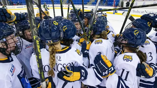 Women's ice hockey celebrates after win