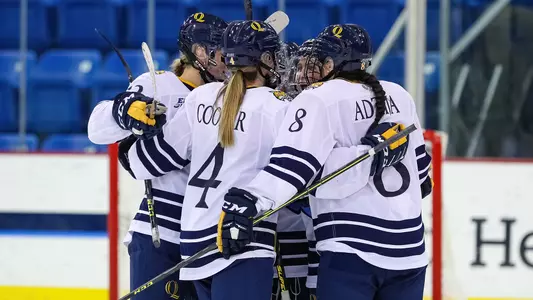 Team celebrates after scoring