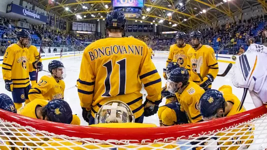 Wyatt Bongiovanni Leads Pregame Huddle Against Yale