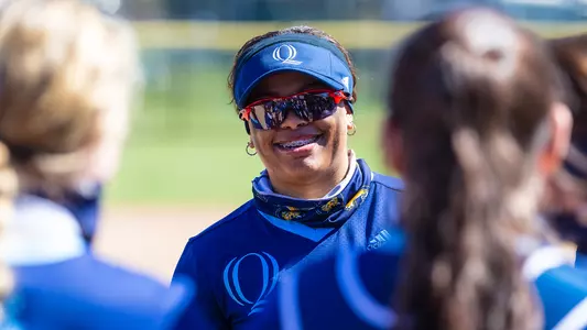 Kayla Thomas smiles before first pitch