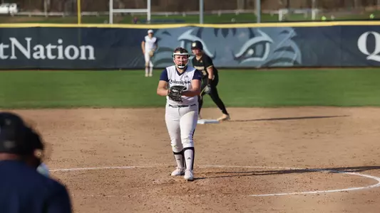 Sydney Horan pitches vs Bryant