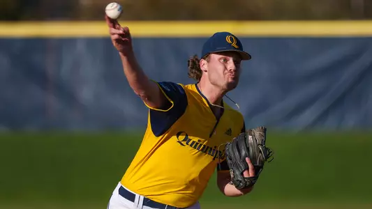 Derek Goldrick delivers to the plate