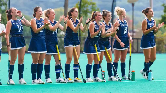 Field hockey celebrates a goal