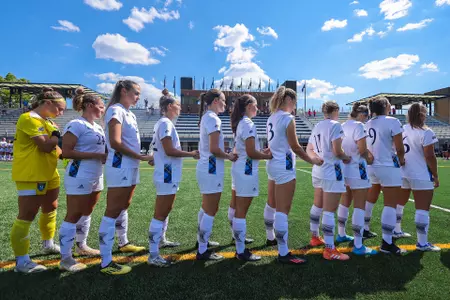 Bobcats Stand for the National Anthem