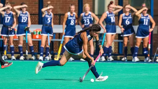Amanda Funaro carries a ball upfield