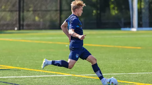 Magnus Reistad sends in the ball to his teammates