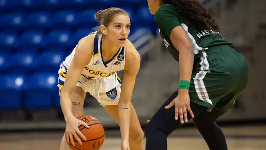 Makenzie Helms sets up the offense vs. Manhattan
