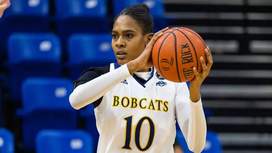 Mary Baskerville sizes up her defender
