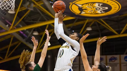 Mary Baskerville attempts a layup vs Manhattan