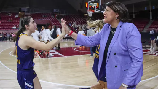 Jackie Grisdale and Tricia Fabbri high five