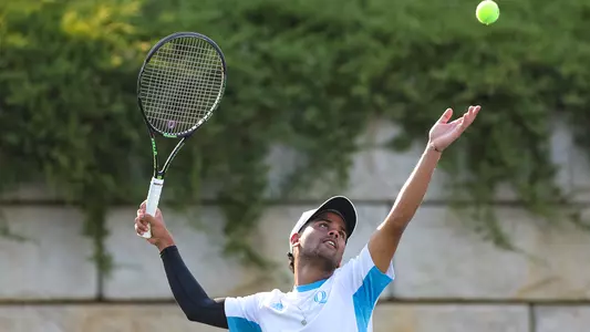 Shaurya Sood tosses for a serve
