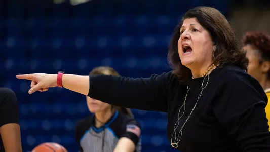 Tricia Fabbri directing the team