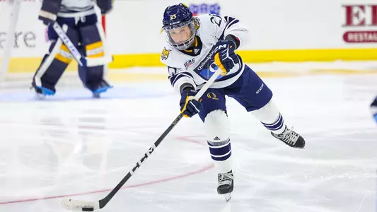 Nina Steigauf shoots a puck