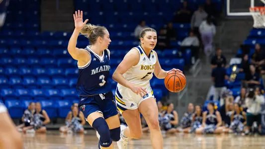 Paige Girardi drives past defender