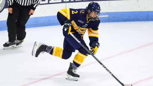 Zoe Uens skating in a game against Yale