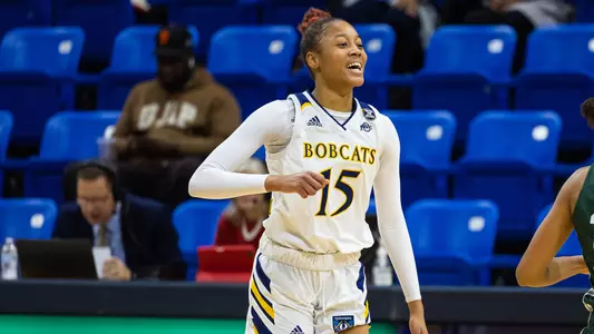 Cur'Tiera Haywood celebrates a score vs Manhattan
