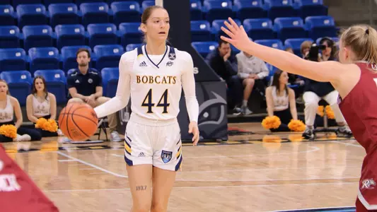 Makenzie Helms sets up the offense vs Rider